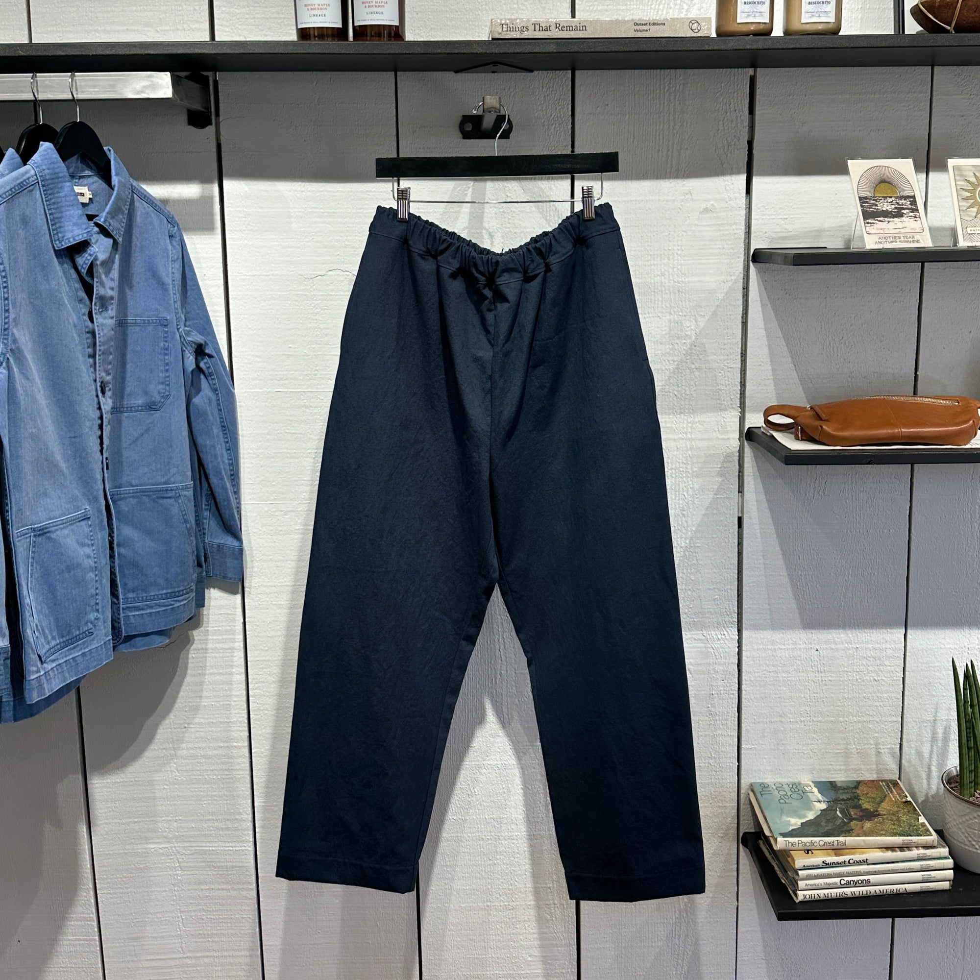 William Frederick Clothing Designed To Be Polished navy elastic-waist pants on display