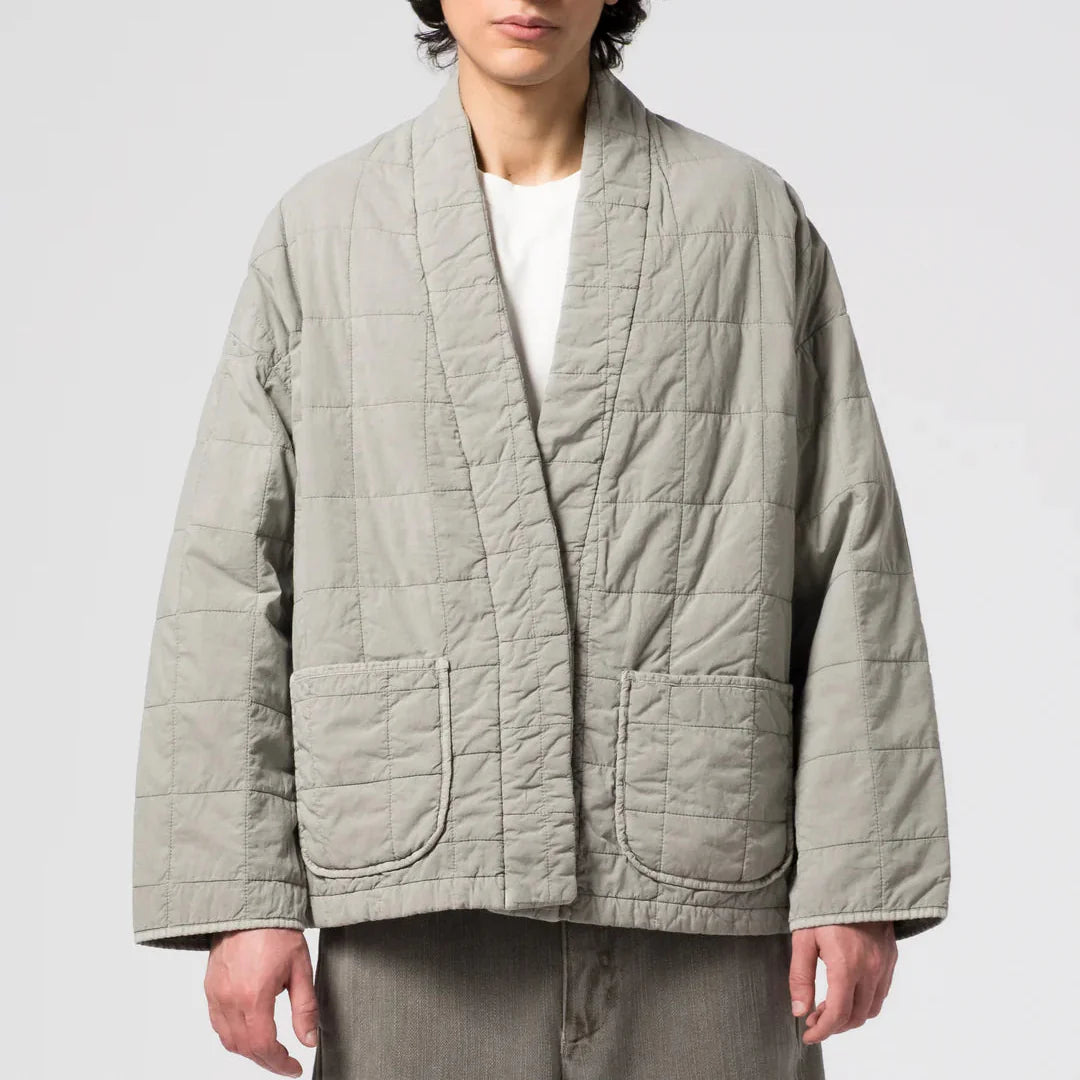 EAT DUST Gear quilted oversized light-gray jacket with large patch pockets for urban outdoor versatility.