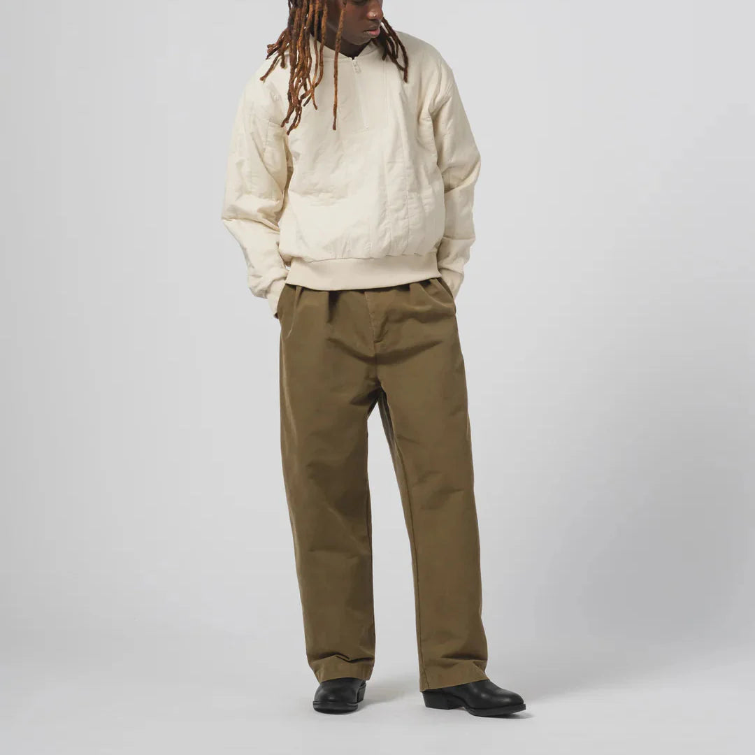 Male model in beige oversized sweatshirt and khaki trousers, from Just In Fresh Arrivals And Latest Trends.