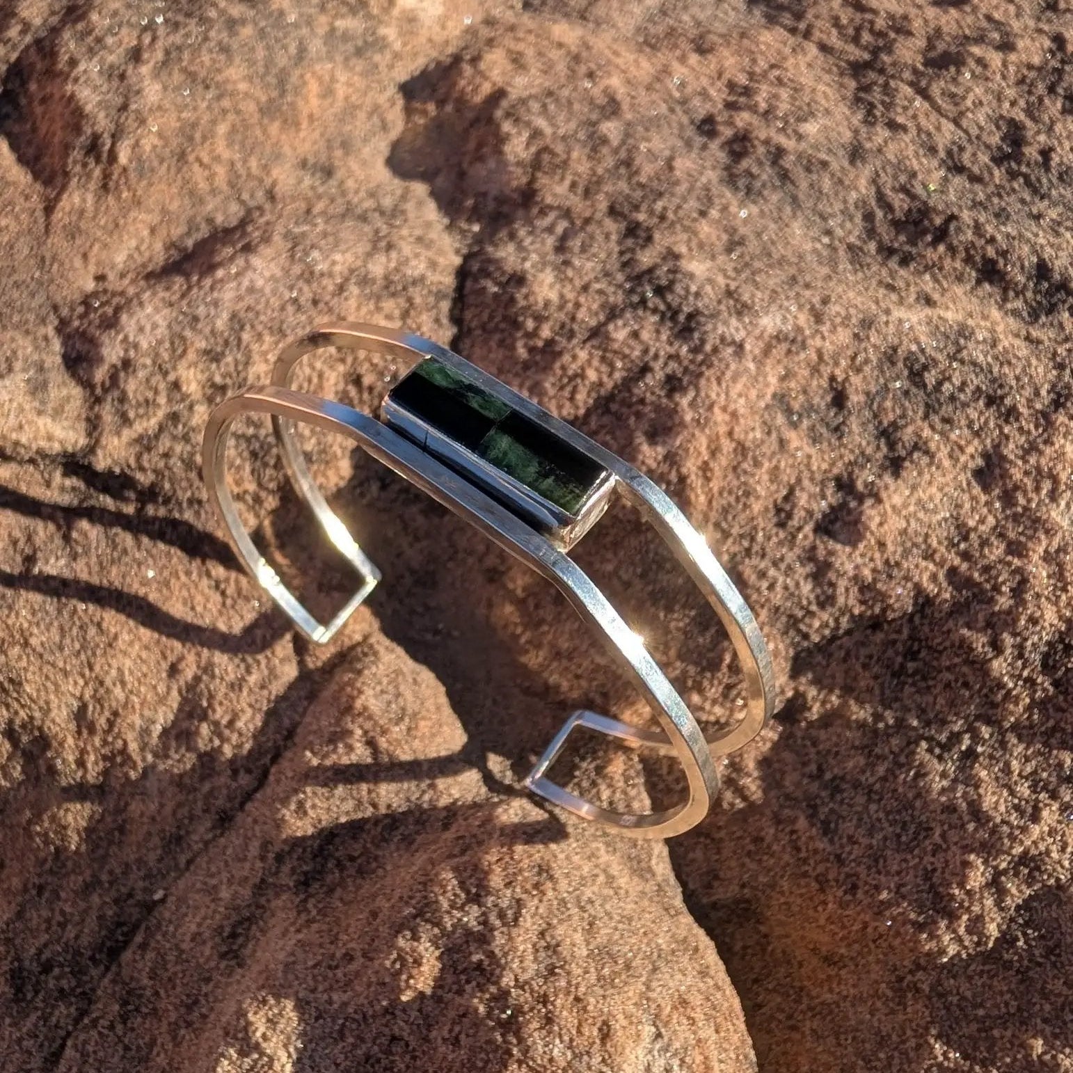 One Seed Designs double-band sterling silver bracelet with Edwards Black Jade and Wyoming Jade stones.