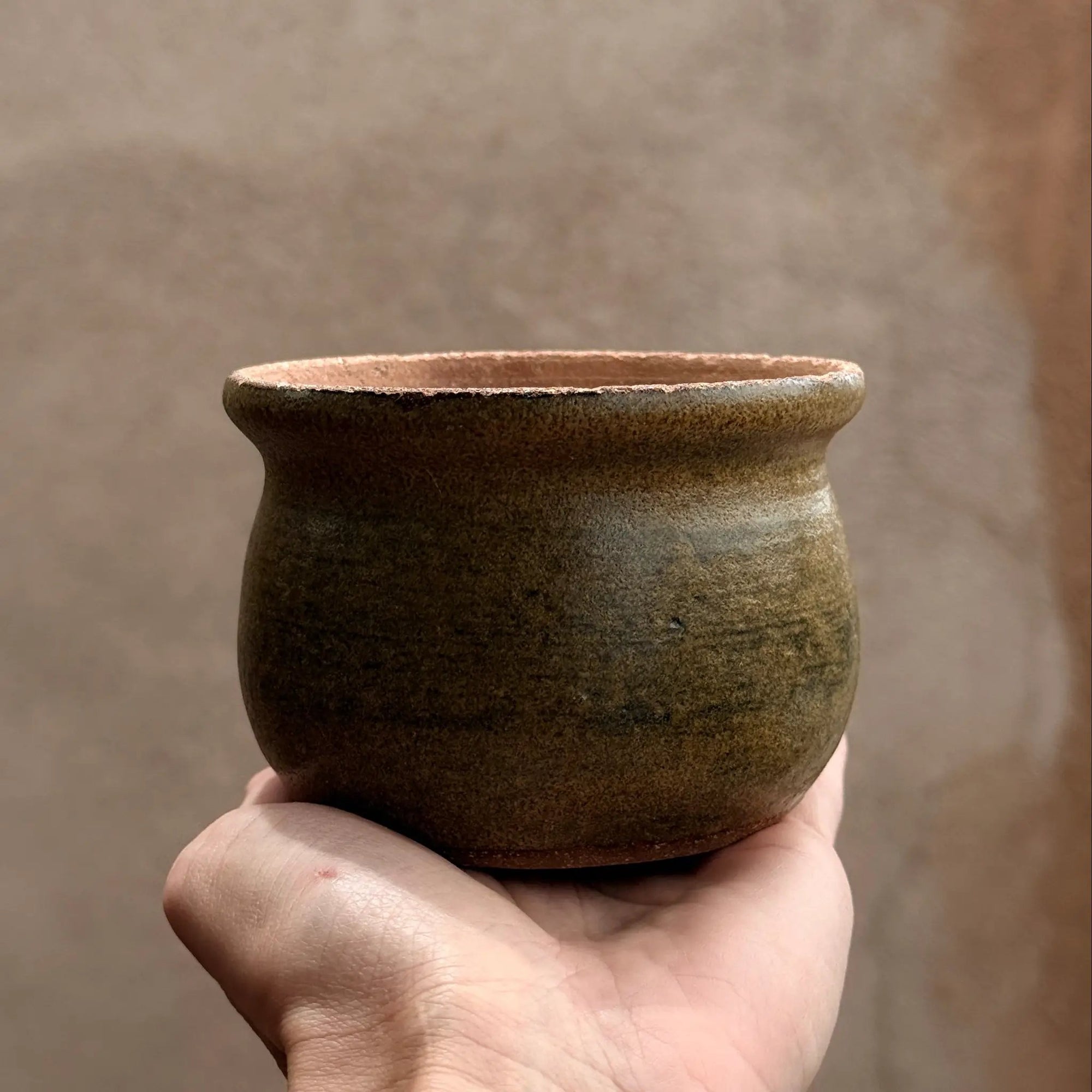 PL Small Brown Ceramic Bowl with White Interior by Above Snakes