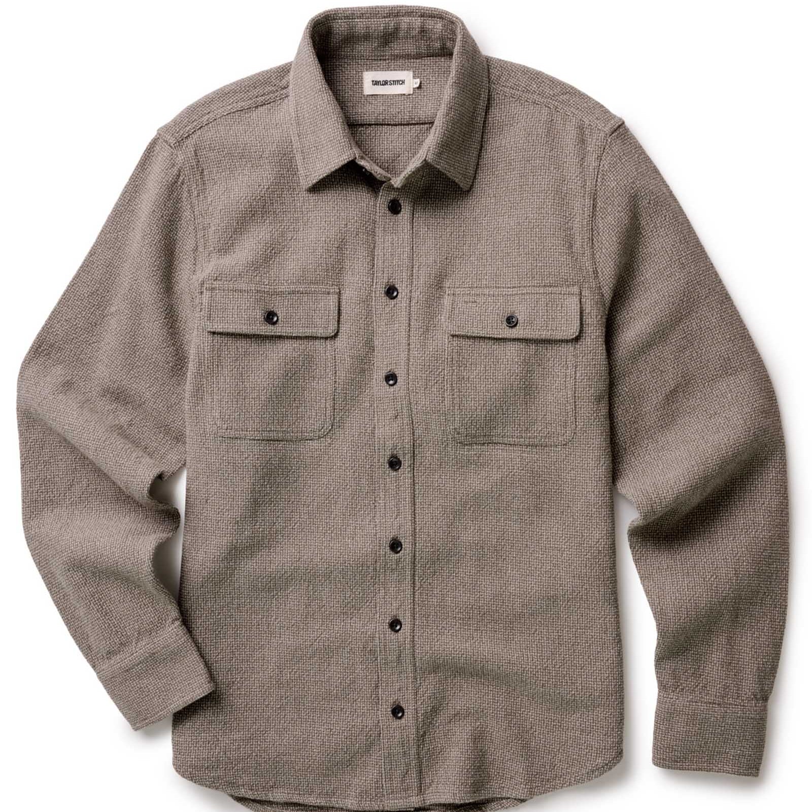Green/Brown flannel shirt with two front pockets on a white background